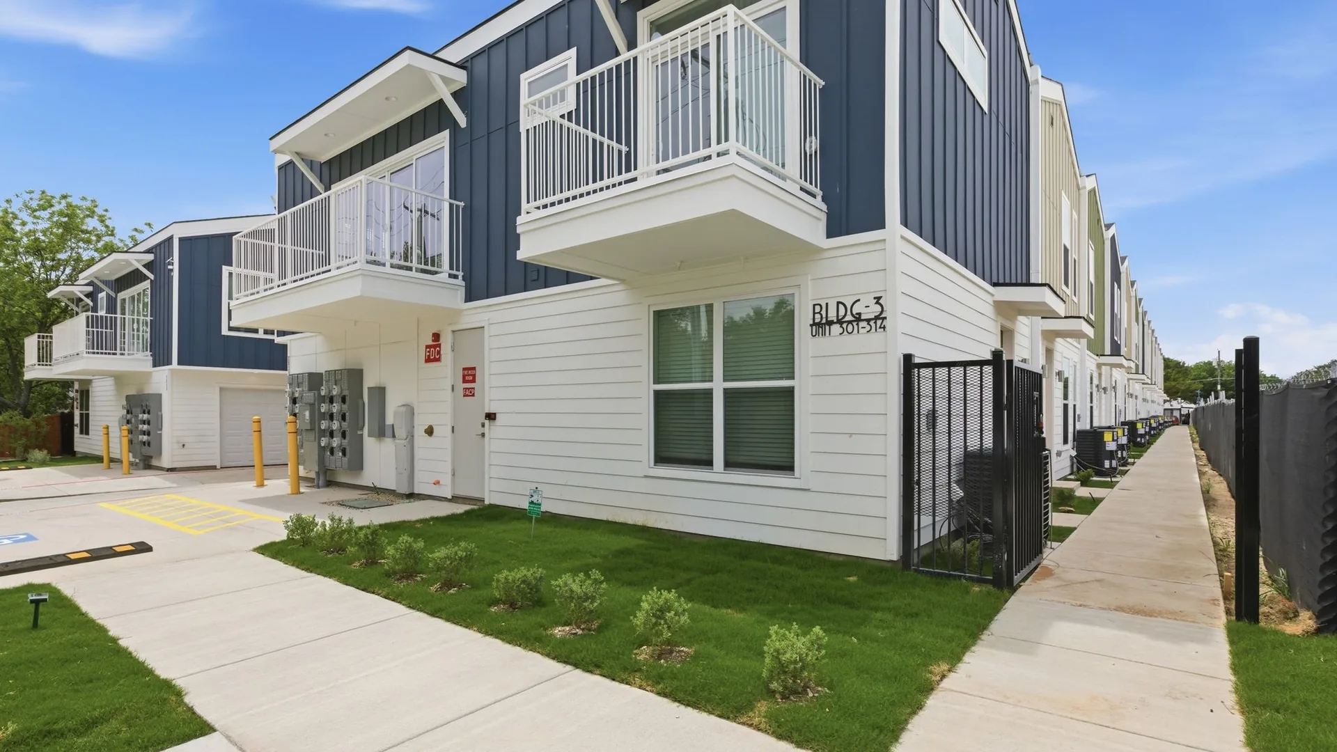 2925 Spruce Valley Ln, Unit 301, Dallas, seen from the street.